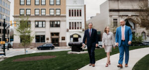 Indiana lawyers walking on a sidewalk in Lafayette, Indiana discussing law issues.